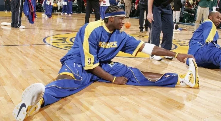 A basketball player wearing Tear-away pants