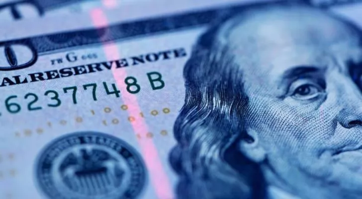 Security thread glowing on a $100 bill 